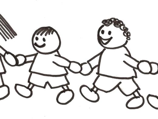 Kinder halten sich an den Händen